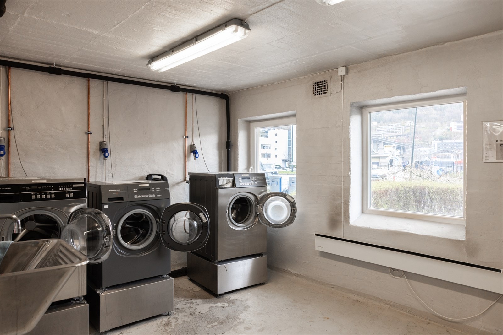 Bygget har en egen vaskekjeller til bruk for beboerne. Galleribilde