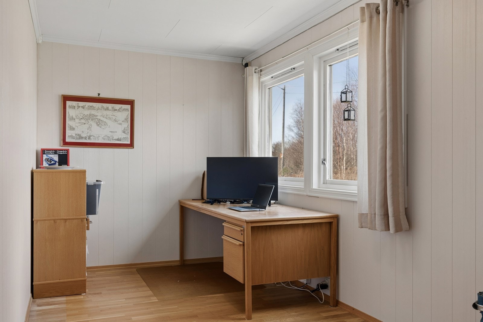 Kontor i tilknytning til stue, som lett kan omgjøres til soverom. Galleribilde