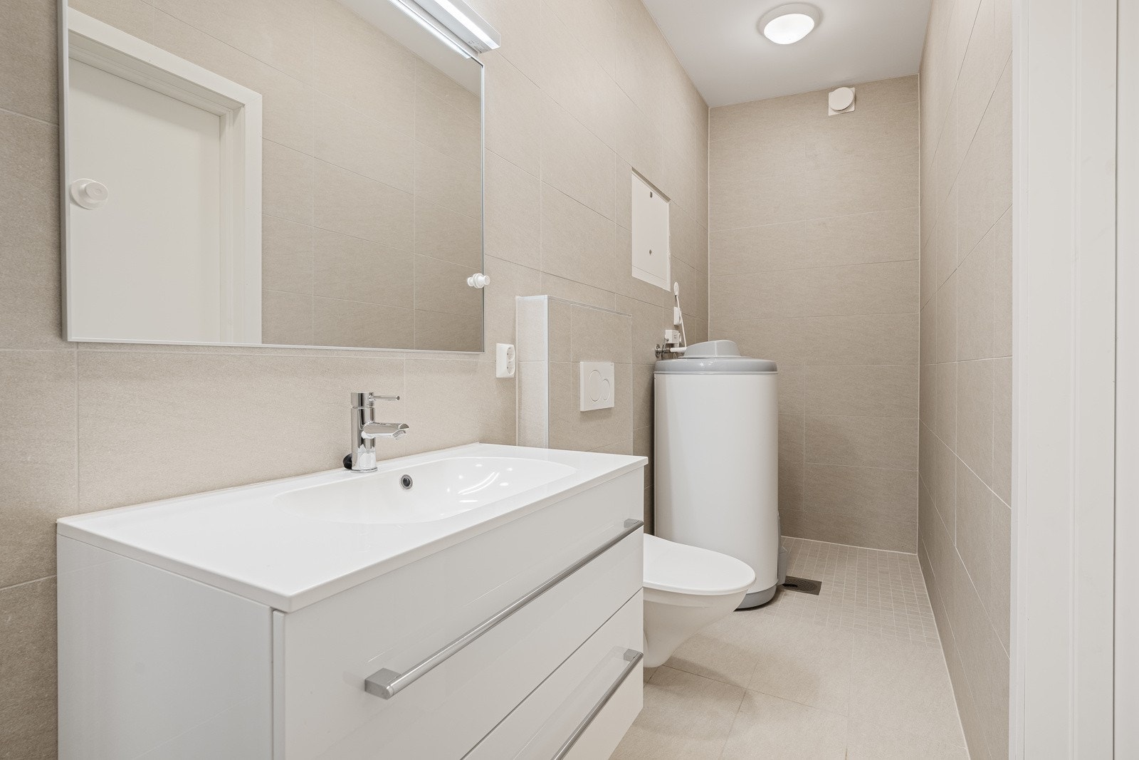 Badet har opplegg til vaskemaskin og tørketrommel Galleribilde