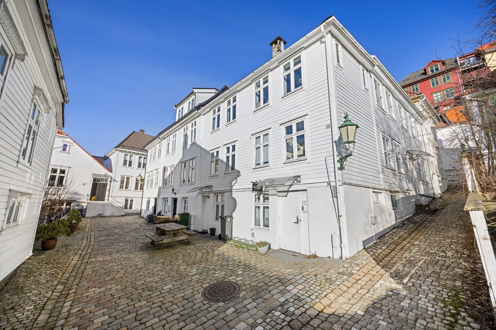 Hyggelige brosteinsbelagte gater og små parker kan bli ditt nye nabolag. Galleribilde