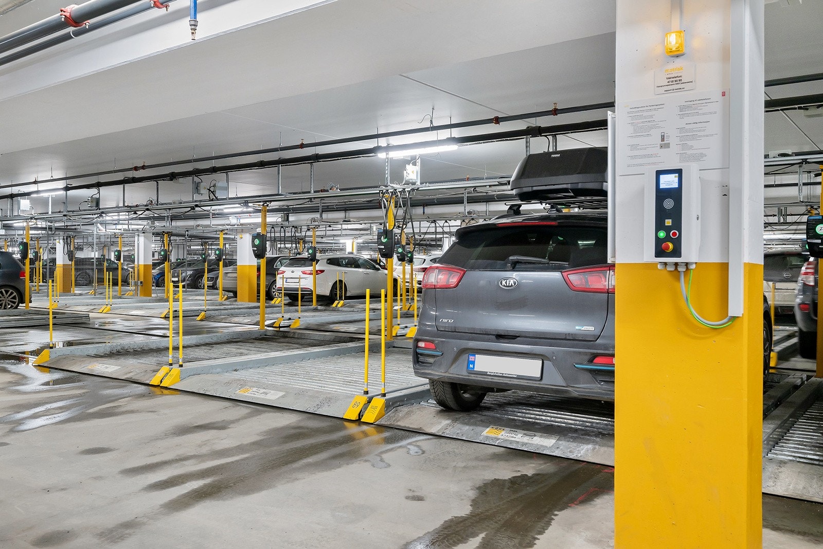 Medfølgende garasjeplass på flåtesystem med el-billader. Galleribilde