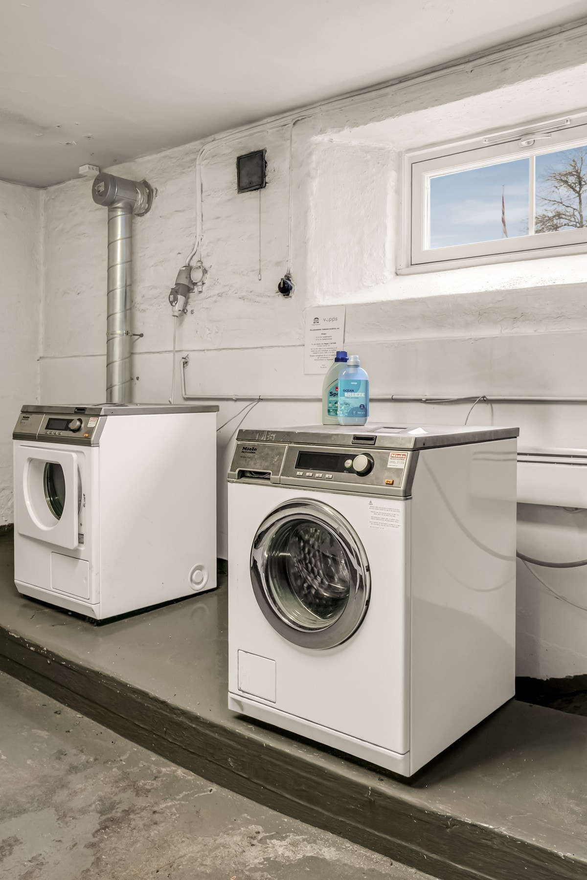 Italiagården har også fellesvaskeri. Galleribilde