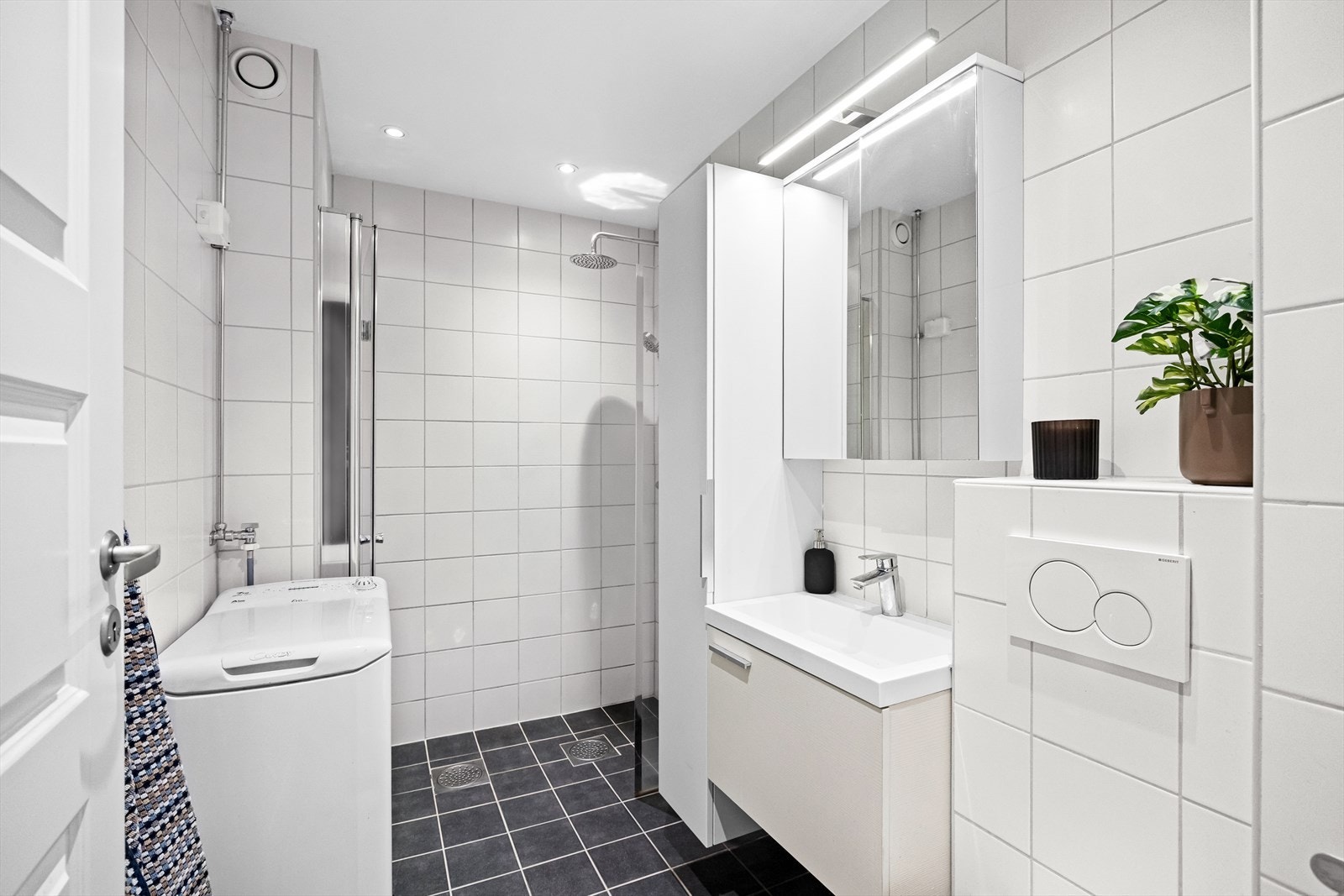 Flislagt bad oppusset i regi av borettslaget i 2013. Galleribilde