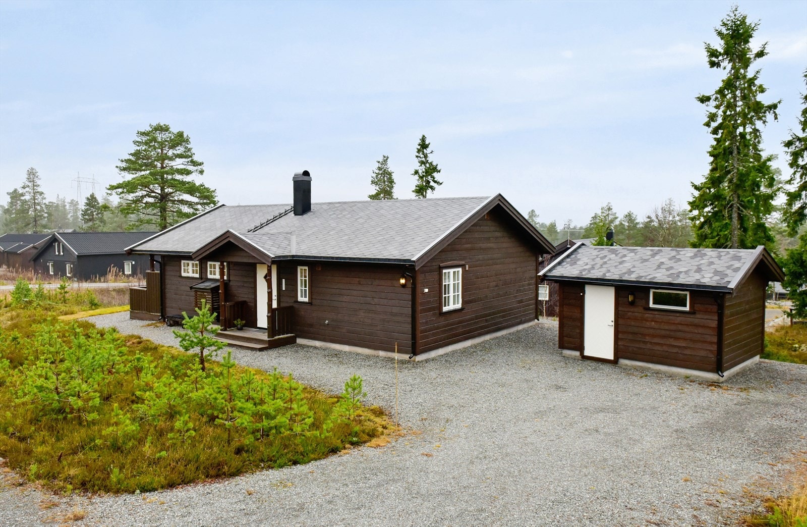 Fritidseiendom fra 2018 med en praktisk, frittstående bod på 12 m² oppført i 2021. Galleribilde