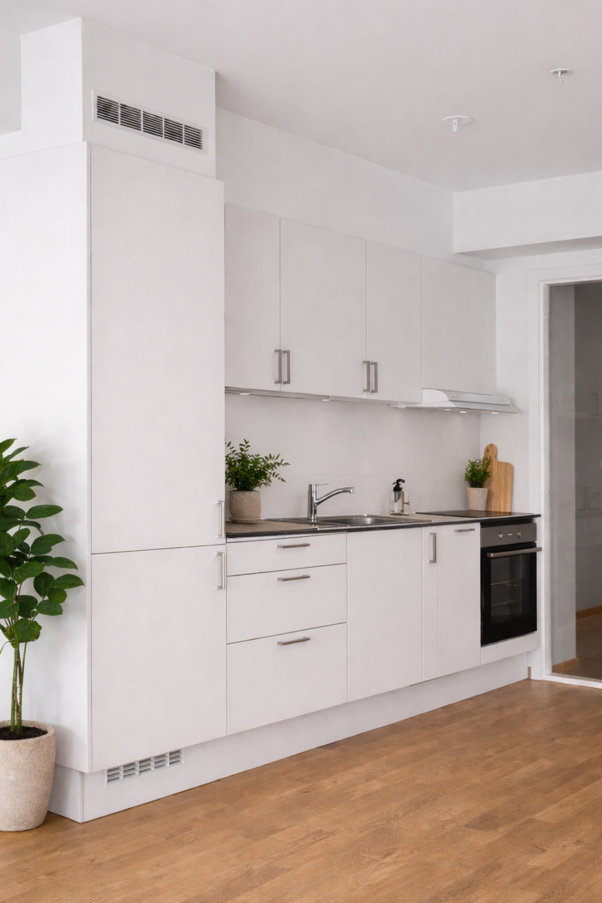 Integrert kjøl/frys, stekeovn, platetopp, oppvaskmaskin og ventilator medfølger handelen. (AI generert møblering, avvik kan forekomme) Galleribilde