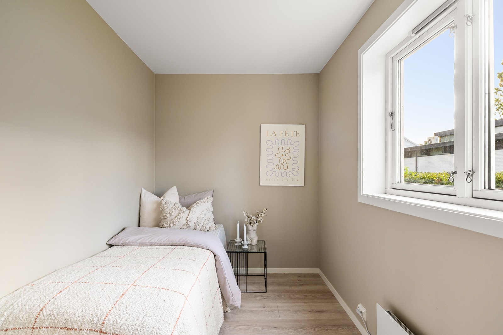 Rommene er malt i lune farger som skaper en god atmosfære. Galleribilde