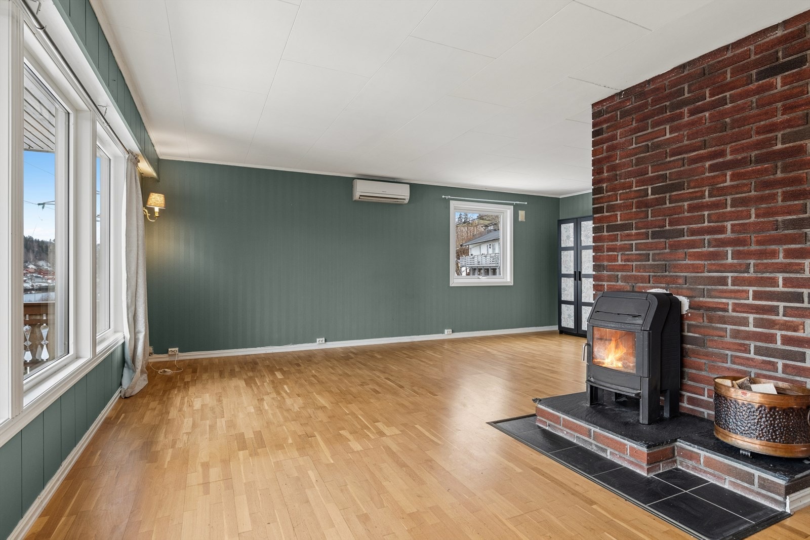 Peisovnen bidrar til å varme opp både rom og stemning. Galleribilde