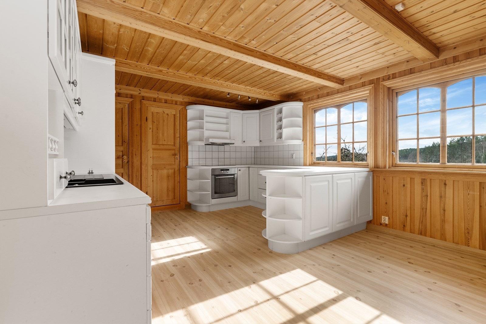 I forbindelse med vindu på kjøkkenet er det fin plass til spisebord. Galleribilde