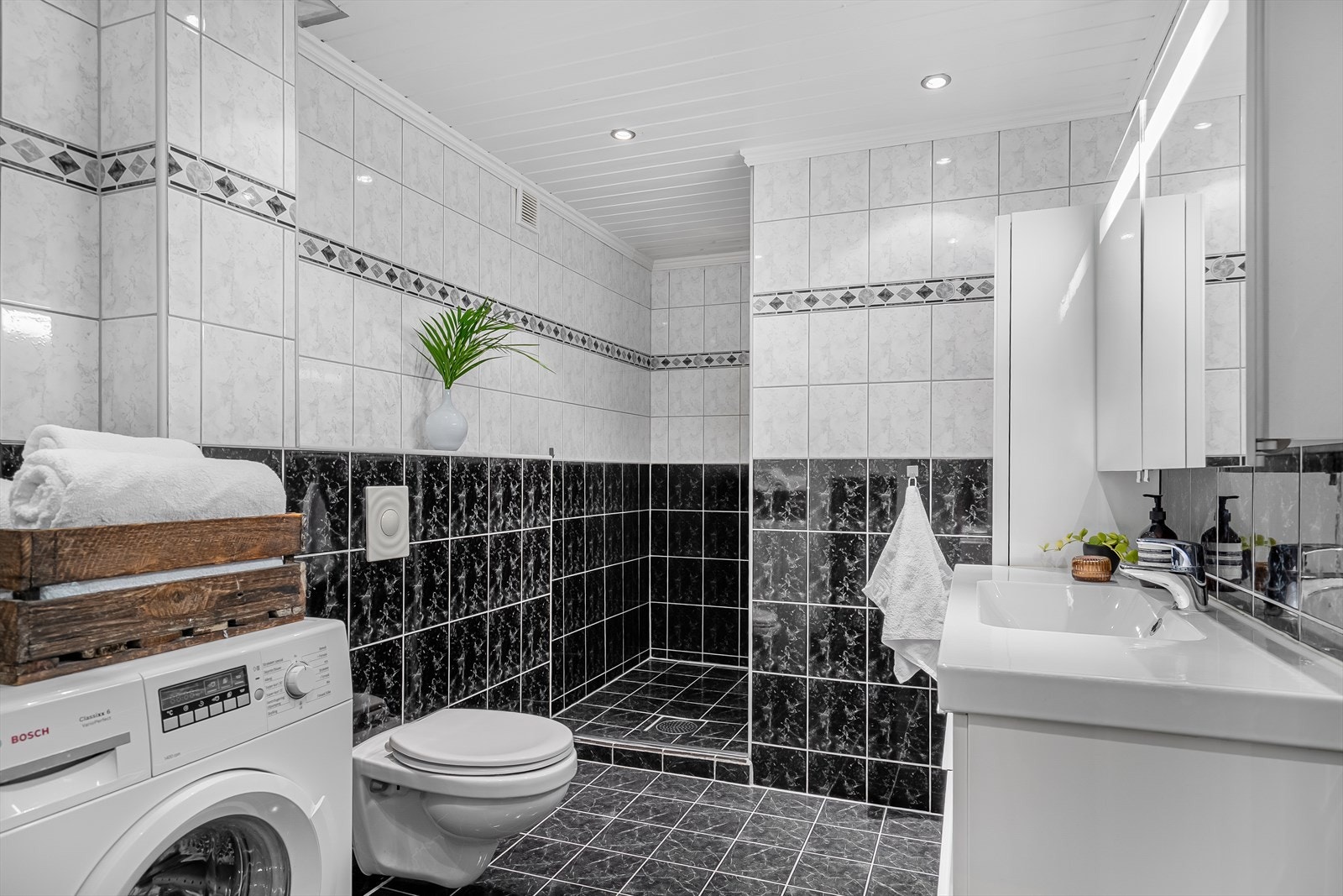 Flislagt bad med varme i gulv. Galleribilde