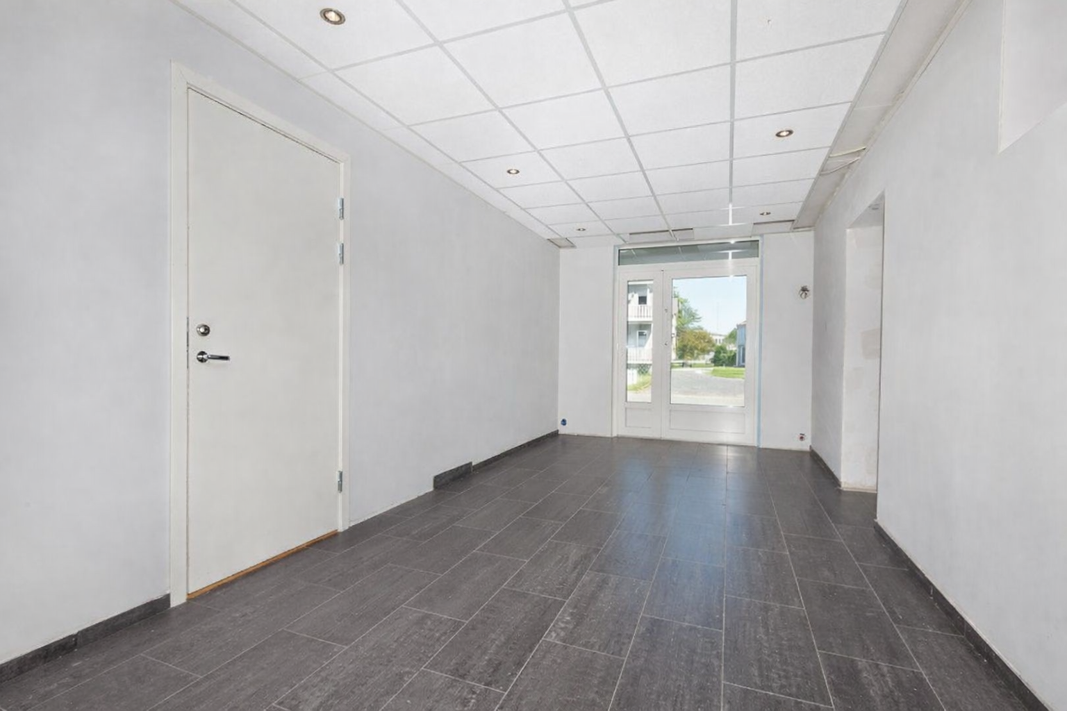 Leiligheten har adkomst via felles inngangsparti. Galleribilde