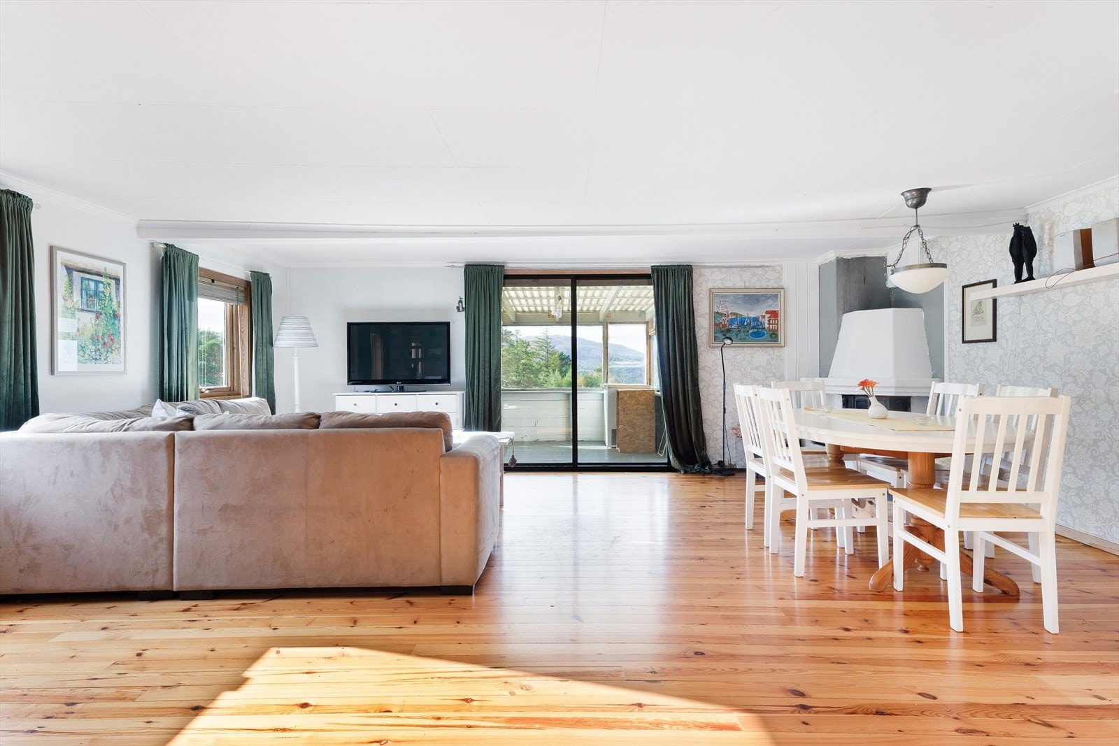 Fra stua kommer man ut til en liten koselig utestue. Galleribilde