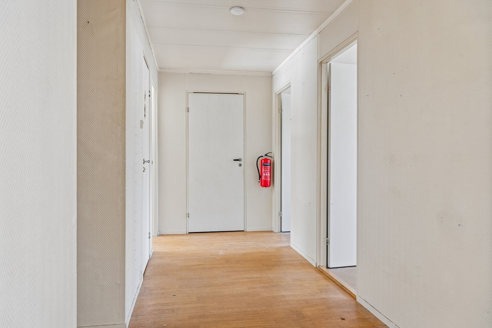 Gangen binder sammen boligens rom. Herfra er det adkomst til kaldtloftet via en himlingsluke. Galleribilde