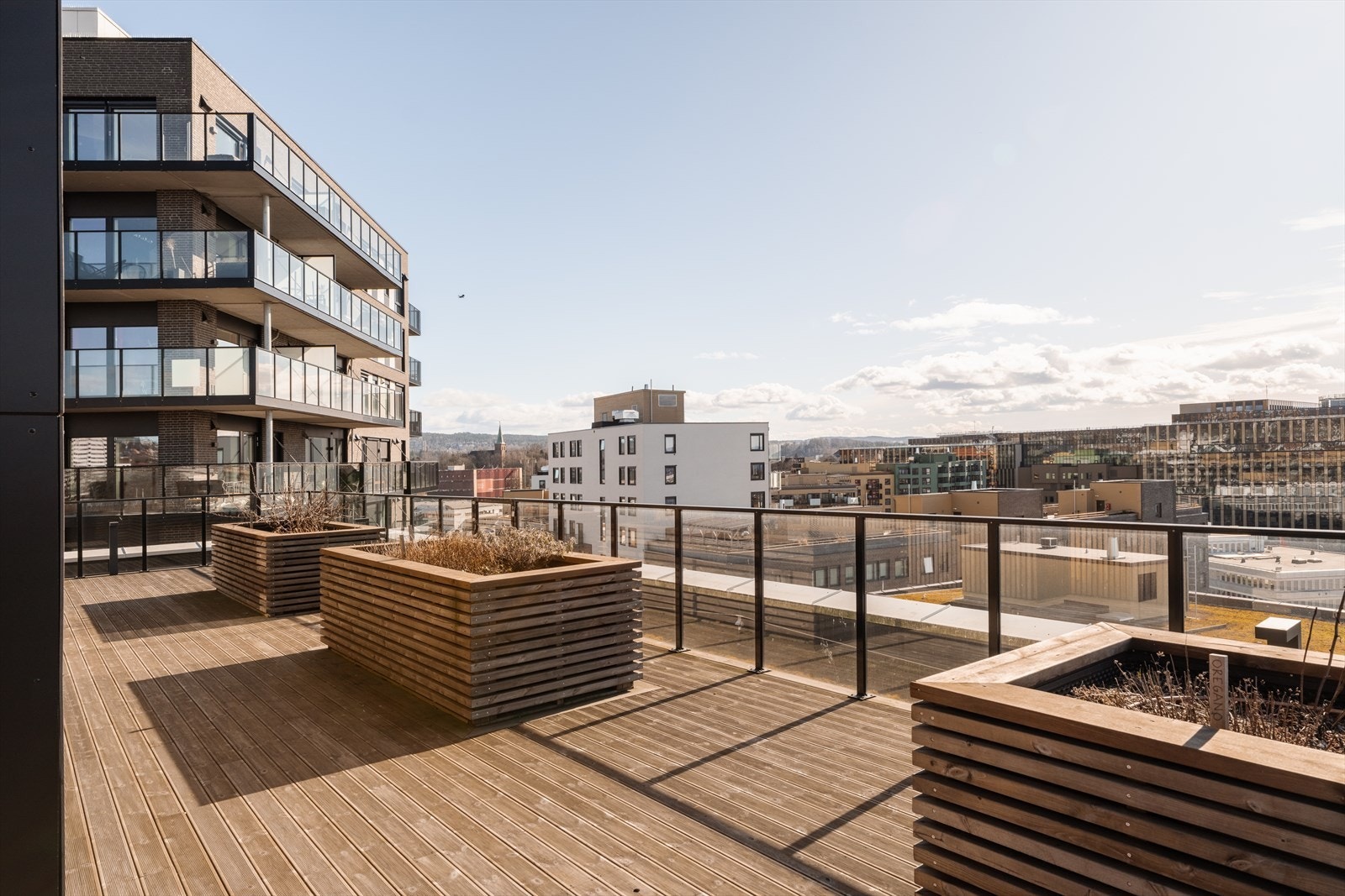 Beboerne kan nyte en felles takterrasse med gode solforhold. Galleribilde