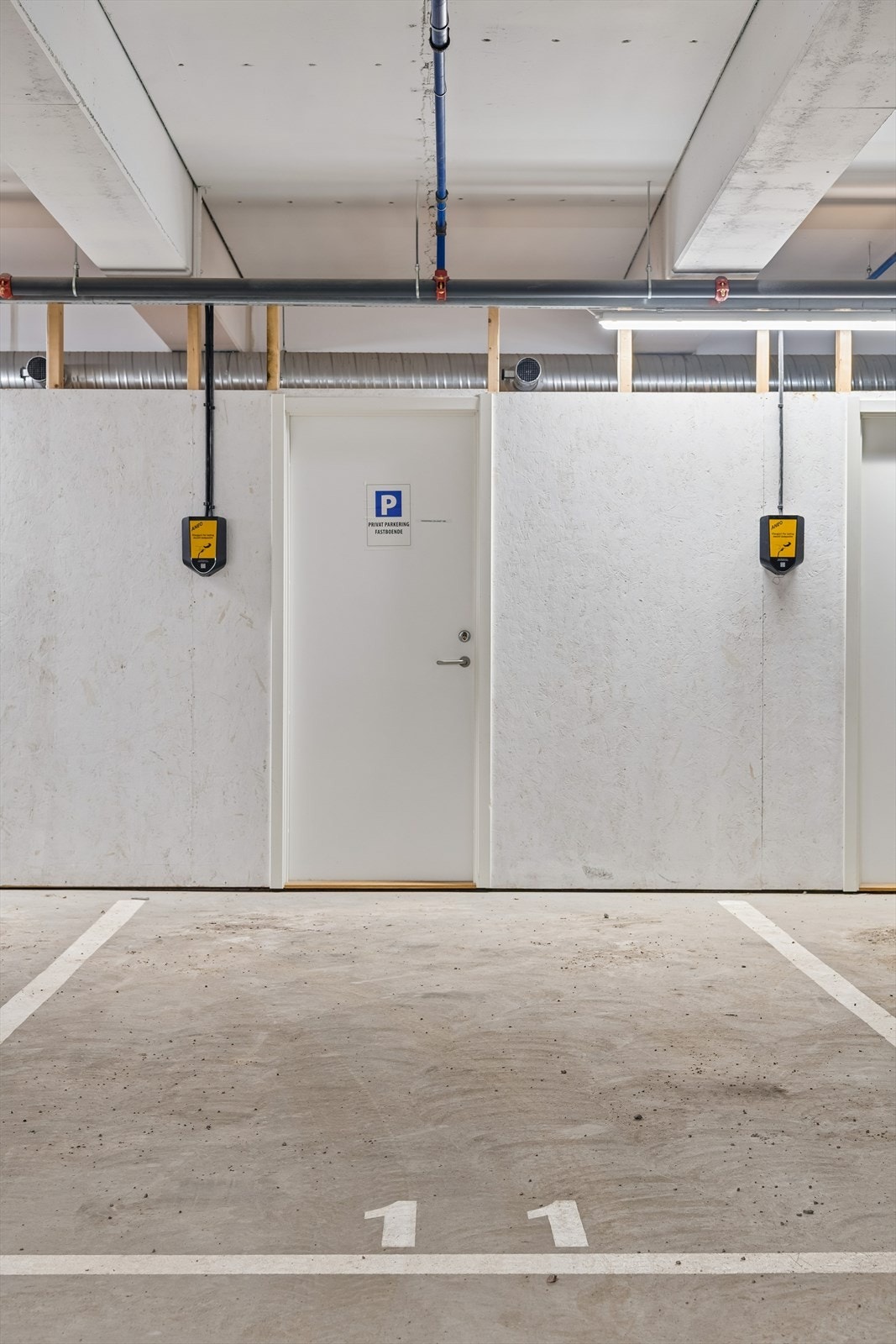 Parkeringsplass i felles garasjeanlegg samt bod på 5 kvm medfølger Galleribilde