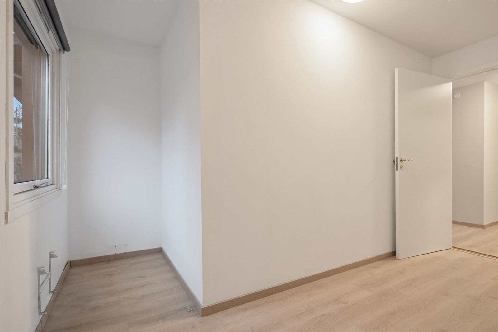 Et rolig rom som vender bort fra fellesarealene. Galleribilde