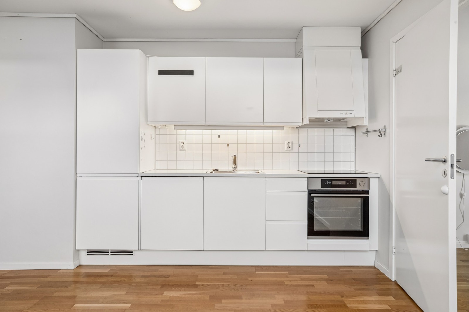 Kjøkkeninnredning fra JKE Design fra byggeår. Galleribilde