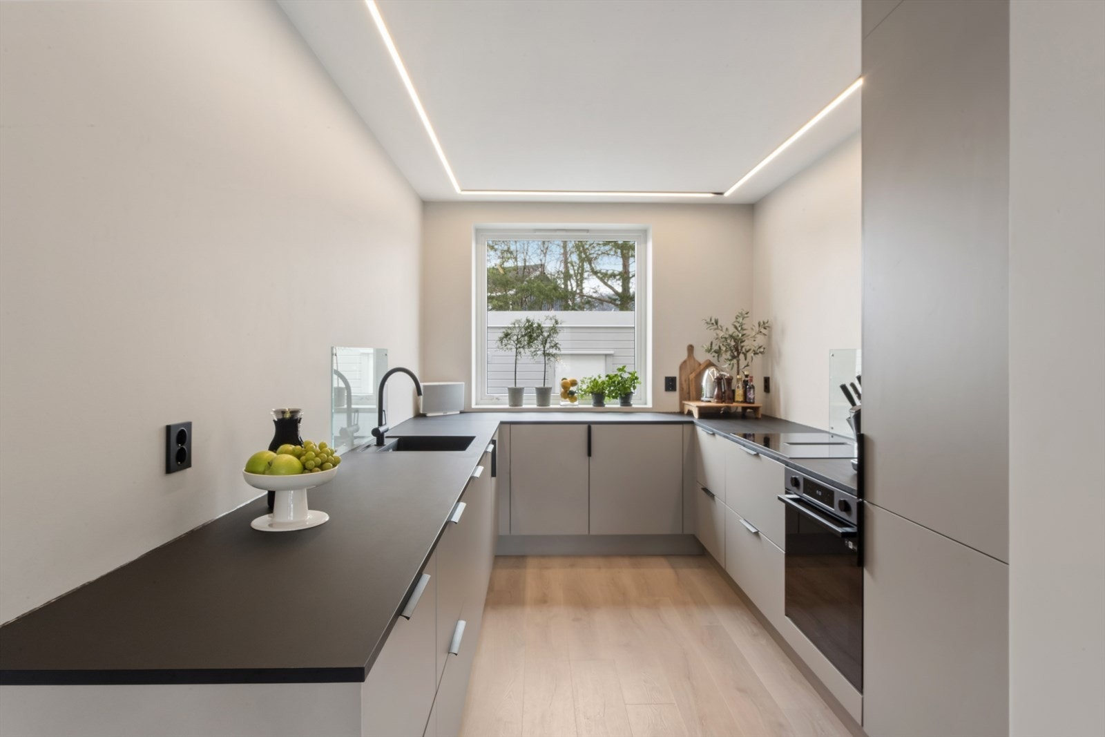 Lekkert kjøkken med moderne løsninger Galleribilde