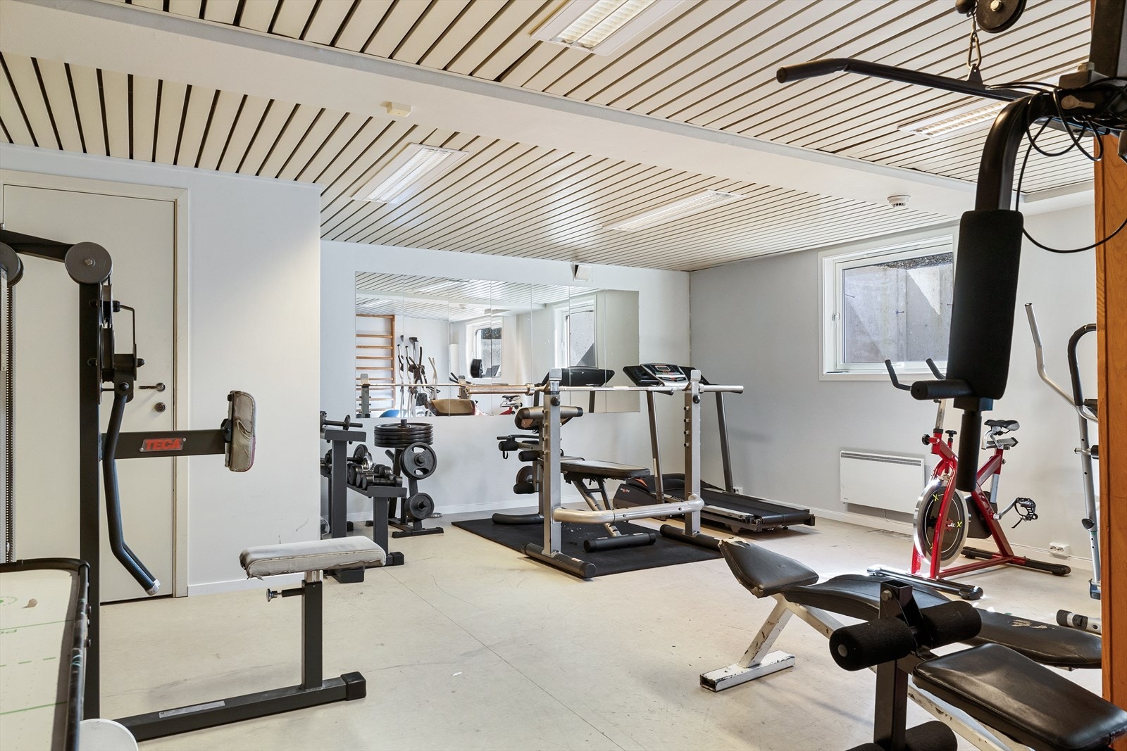 Sameiet kan tilby beboerne et felles treningsrom som ligger i nabobygget, meget praktisk i en ellers travel hverdag. Galleribilde