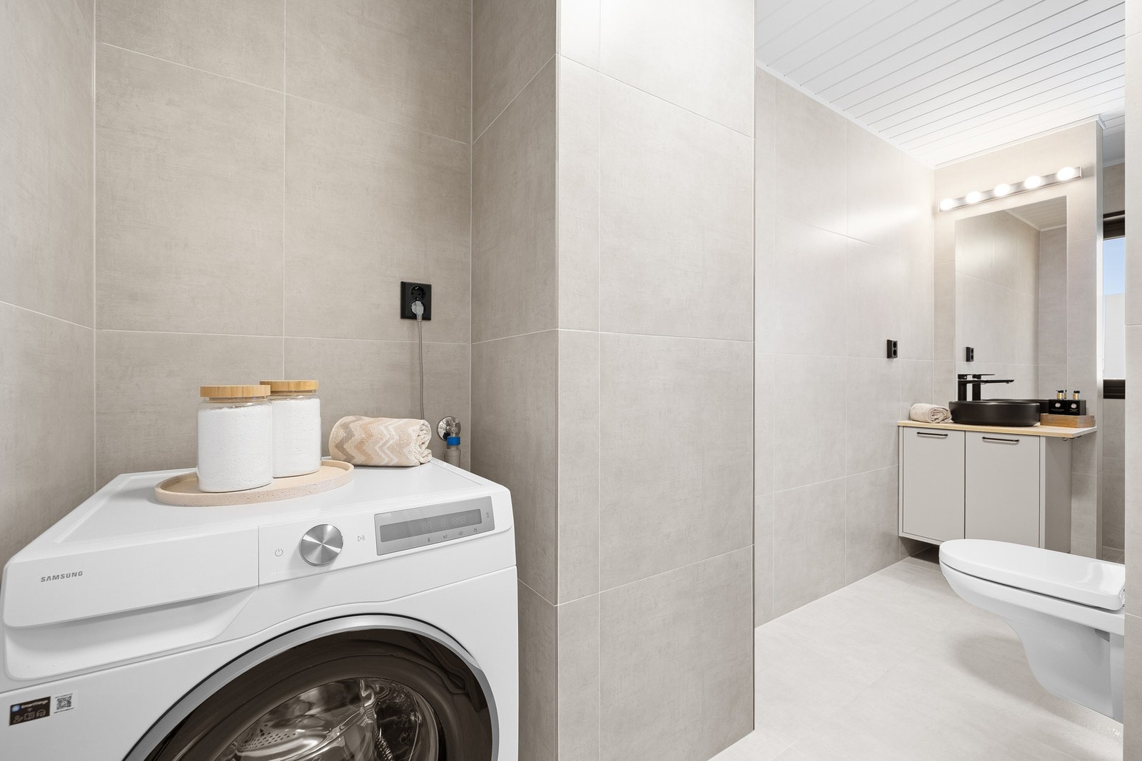 Badet har opplegg for vaskemaskin. Galleribilde