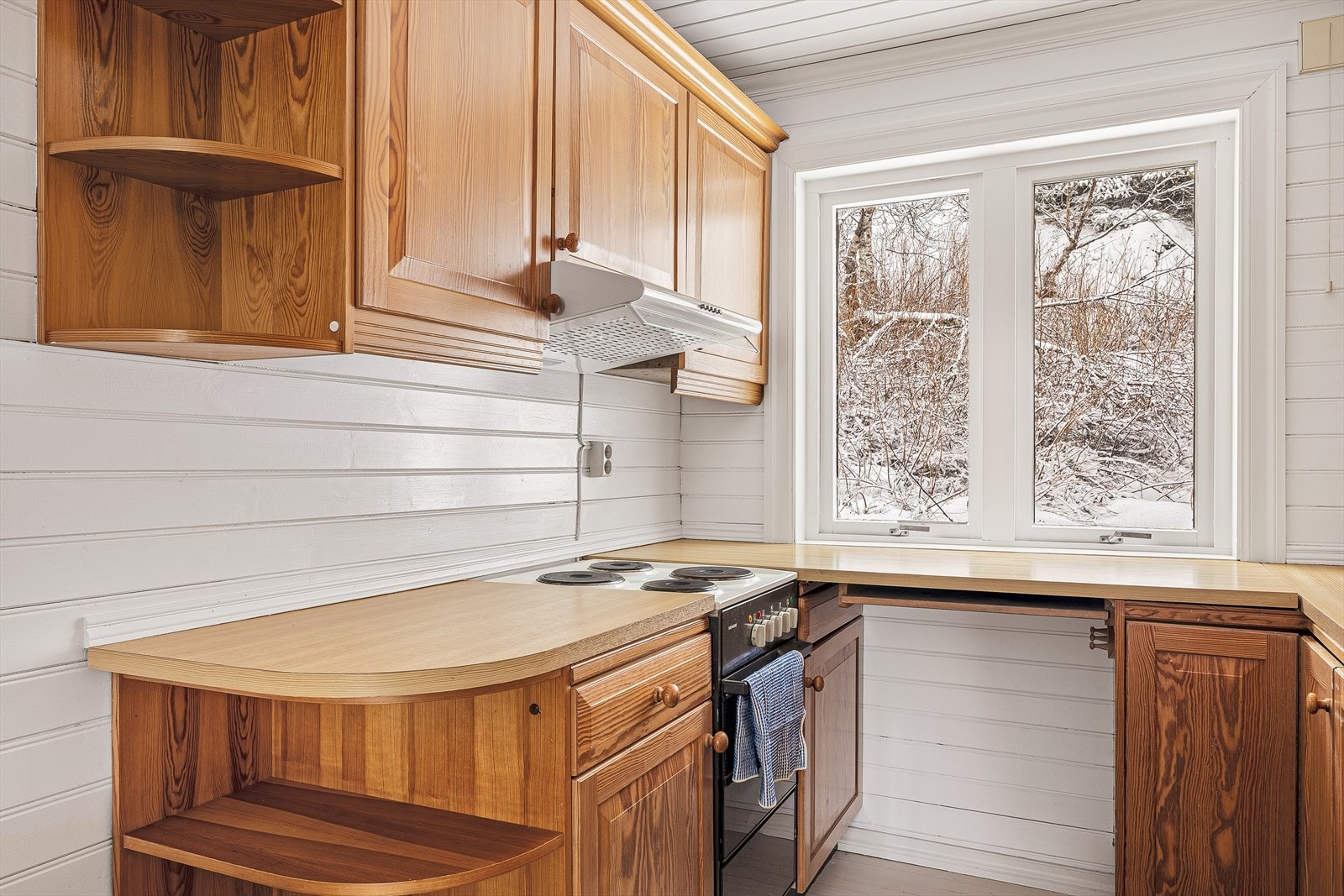 Her har husets kokk gode muligheter for å sosialisere seg med heldige middagsgjester. Galleribilde