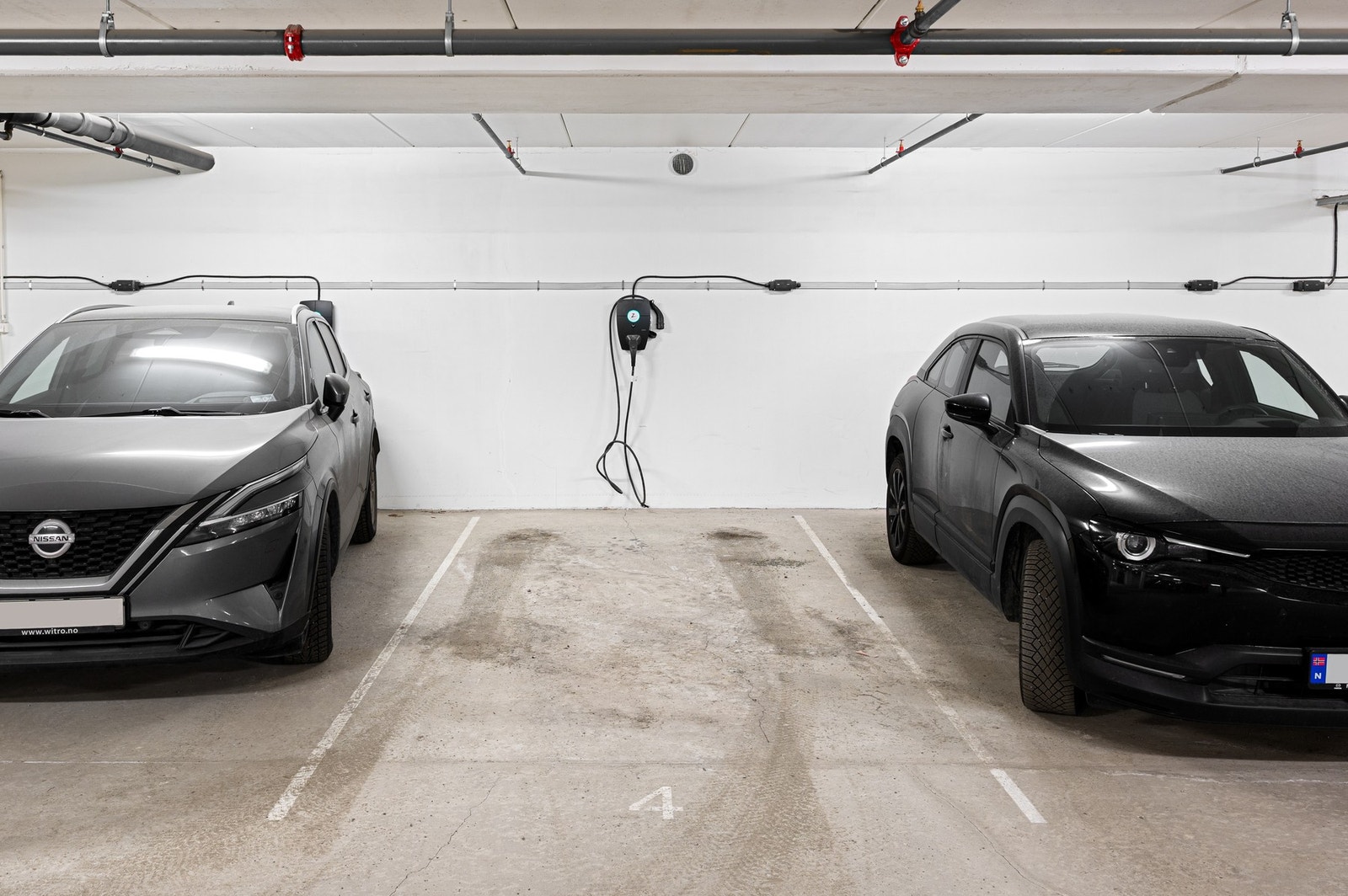 Egen parkeringsplass i garasjekjeller, med mulighet for el-billading. Galleribilde