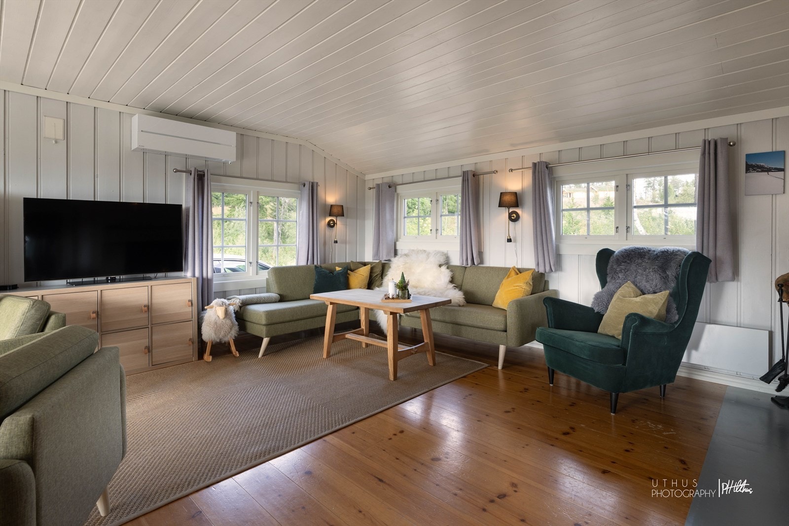 Det er god plass til en stor sofa. Galleribilde