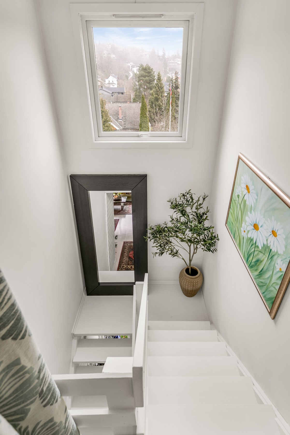 Trappegangen opp er lys og luftig. Galleribilde