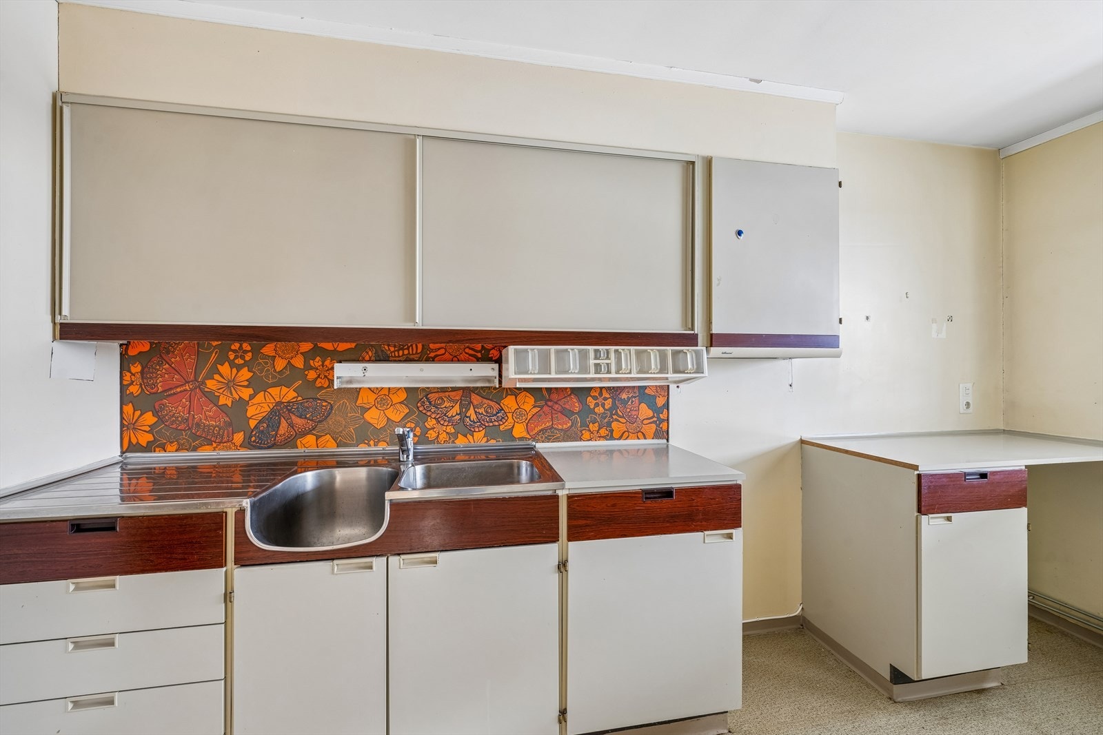 Rommet har godt med plass til å realisere et nytt kjøkken, med en praktisk layout som utgangspunkt. Galleribilde