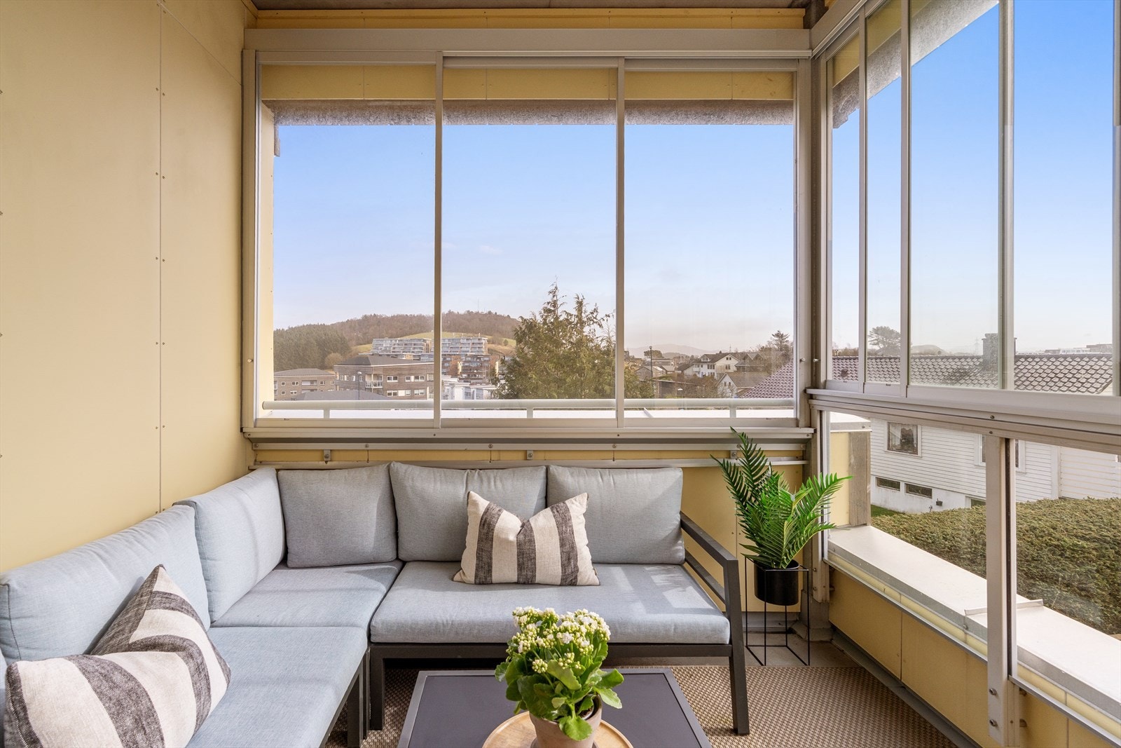 Med tilkomst til en innglasset terrasse Galleribilde