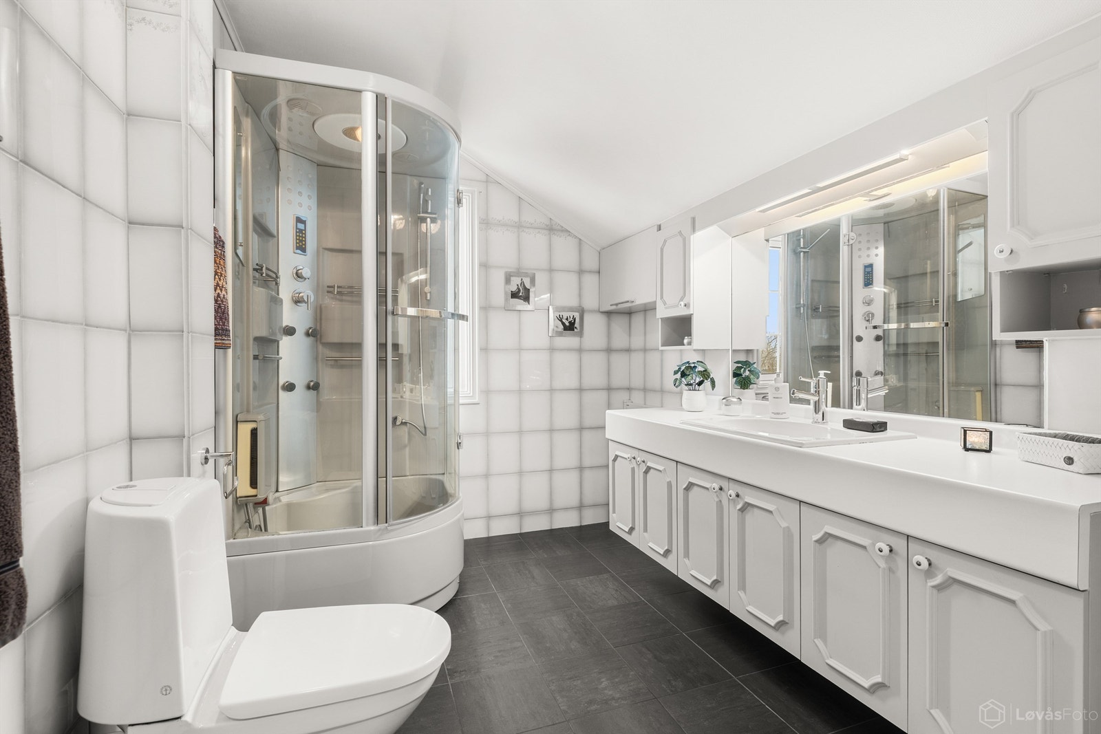 Flislagt bad med gulvvarme Galleribilde
