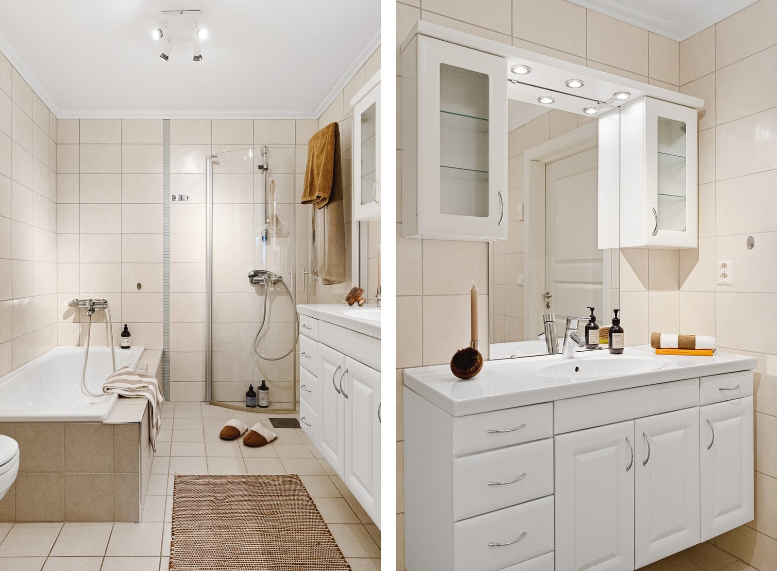 Badet er utstyrt med vannbåren gulvvarme og er innredet med vegghengt toalett, dusj med glassfoldedører, innfliset badekar, servant med møblement, speil og belysning. Galleribilde