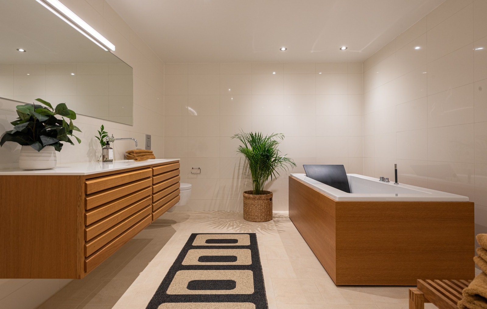 Innholdsrikt bad ved soverommene - Uniform
baderomsinnredning Galleribilde