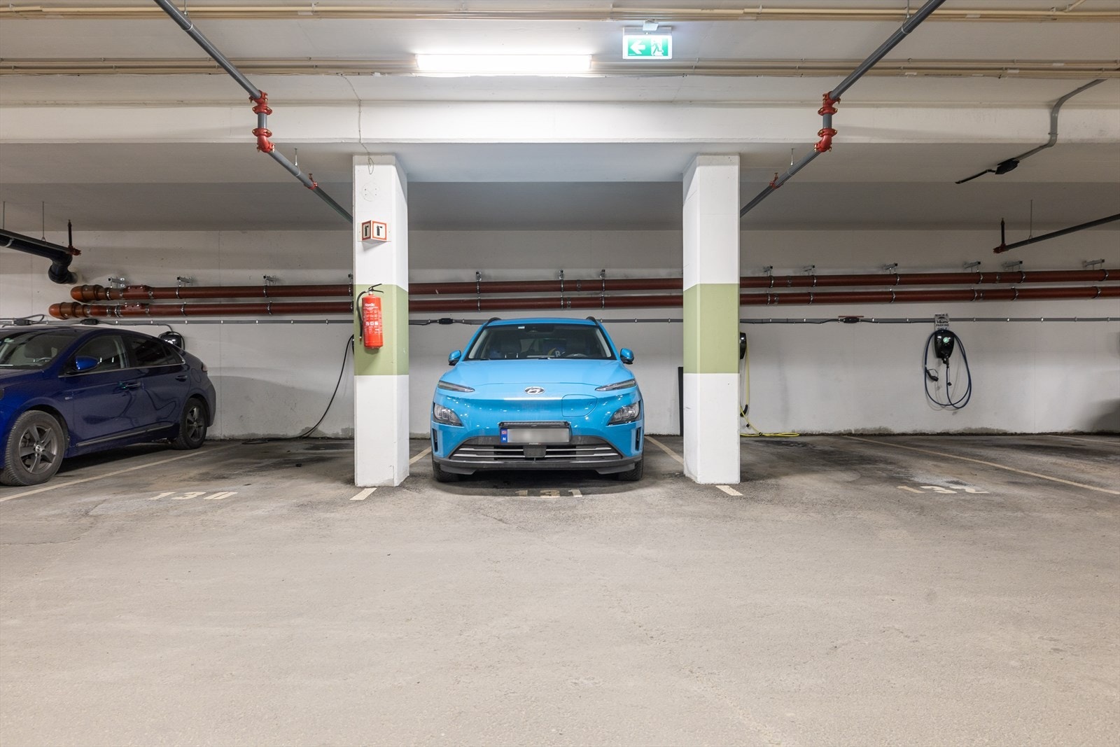 Det medfølger parkeringsplass med lader. Galleribilde