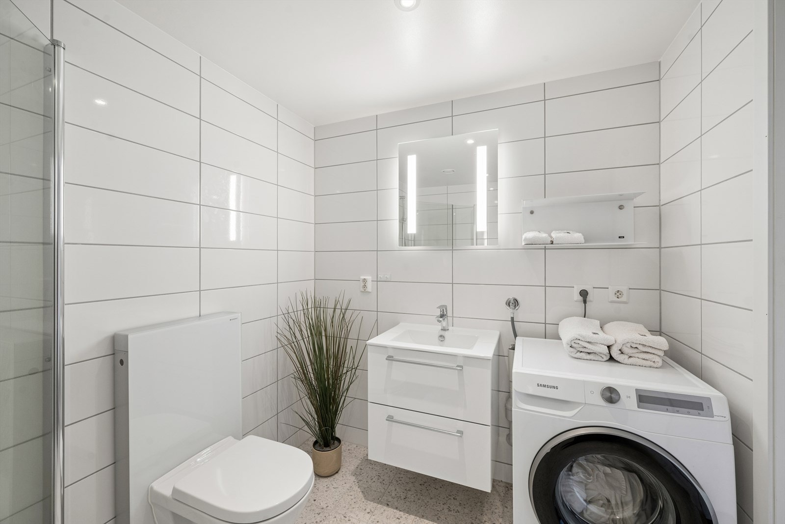 God plass til vaskemaskin/tørketrommel. Galleribilde