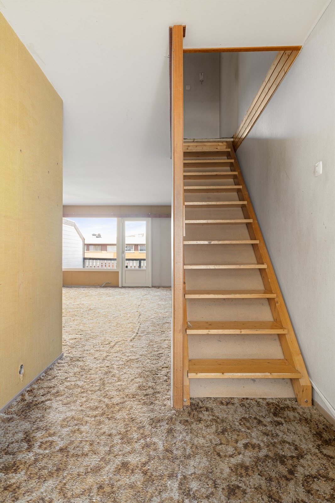 Trappen tar deg opp til boligens tre soverom. Galleribilde