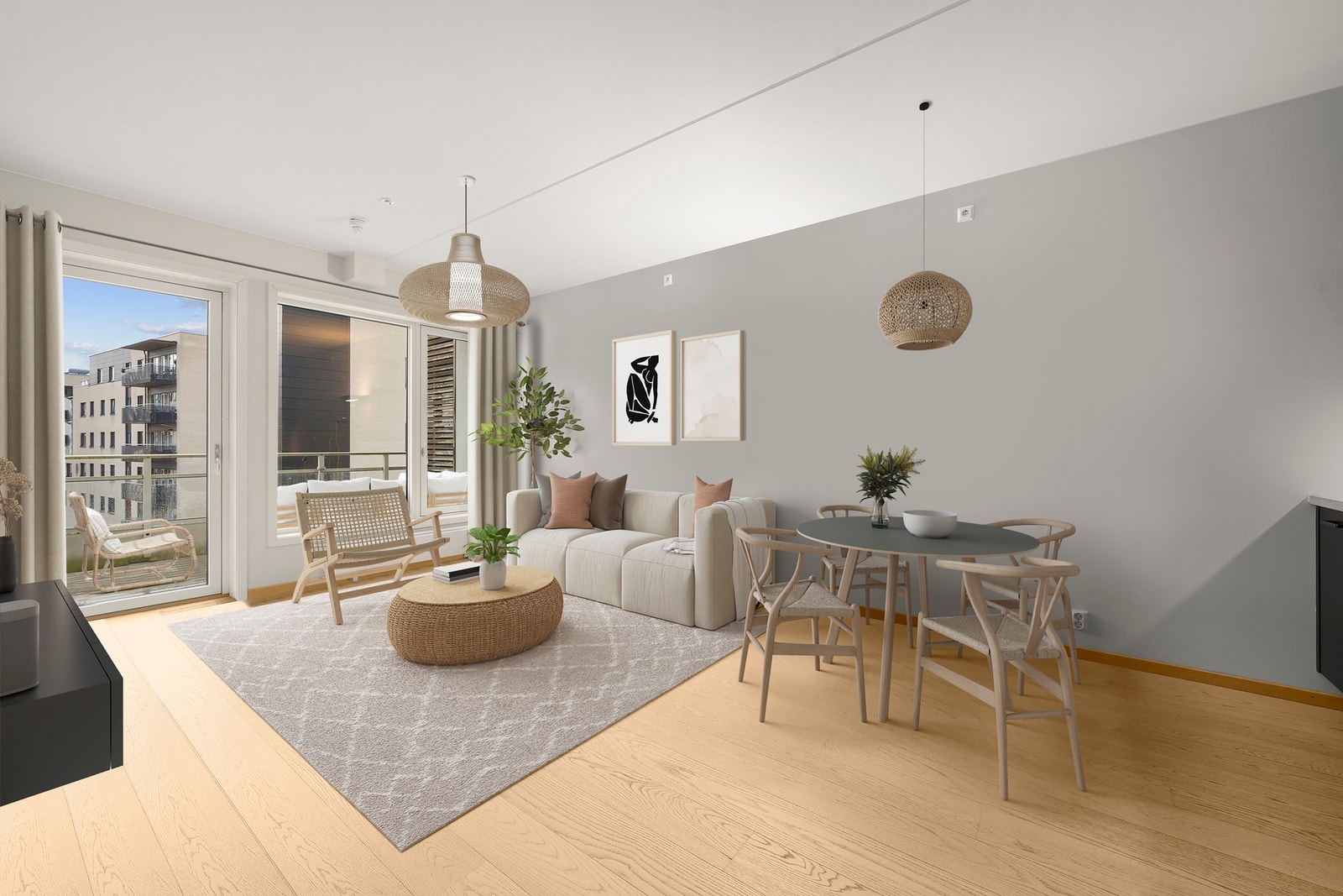 Den åpne planløsningen mellom stue og kjøkken legger til rette for sosiale samlinger og det daglige livet Galleribilde