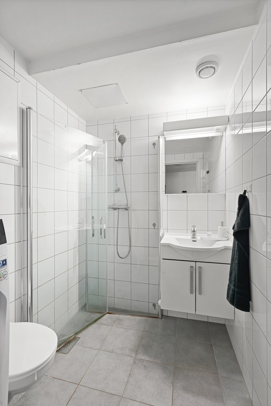 Fliselagt bad med gulvvarme. Galleribilde