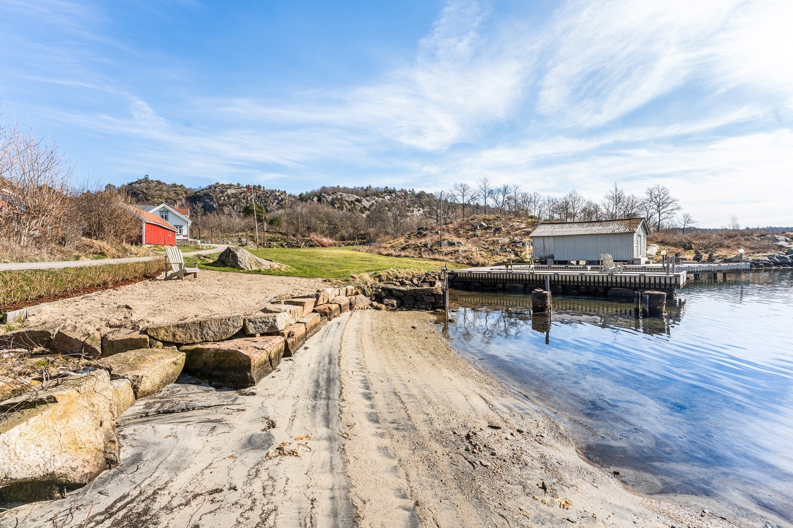 Egen sandstrand. Galleribilde