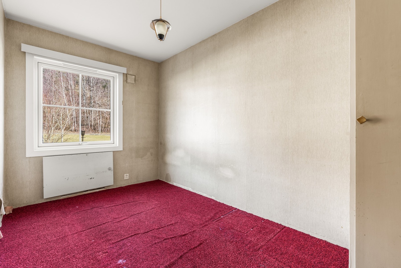 Leiligheten har to soverom med store vindusflater. Galleribilde