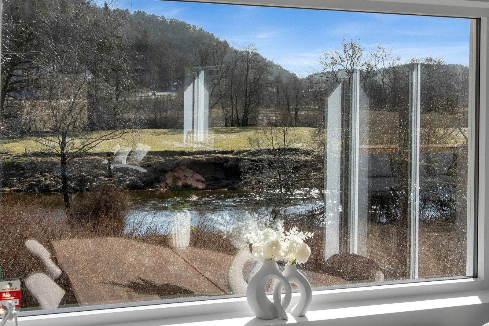 Fin utsikt mot Songdalselva. Galleribilde