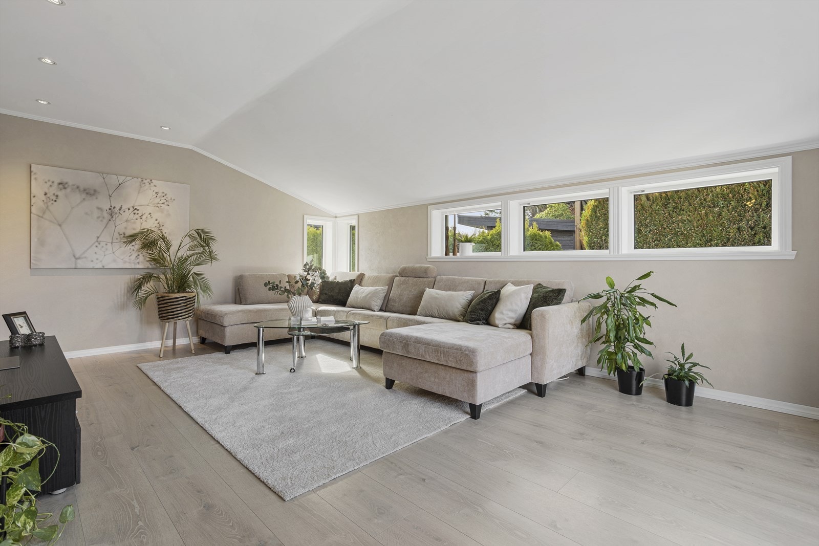 Planløsningen med flere stuerom er perfekt for barnefamilien. Galleribilde