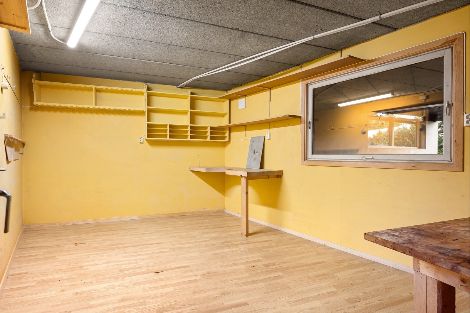 I underetasje er det egen bod for orden og oversikt Galleribilde