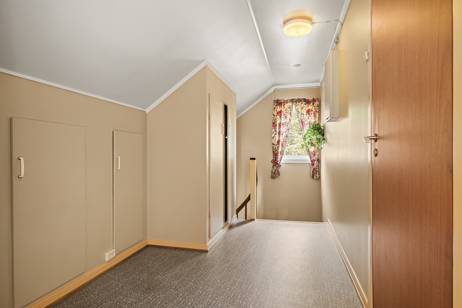 Loftsgangen har integrerte skap for ekstra oppbevaring. Galleribilde