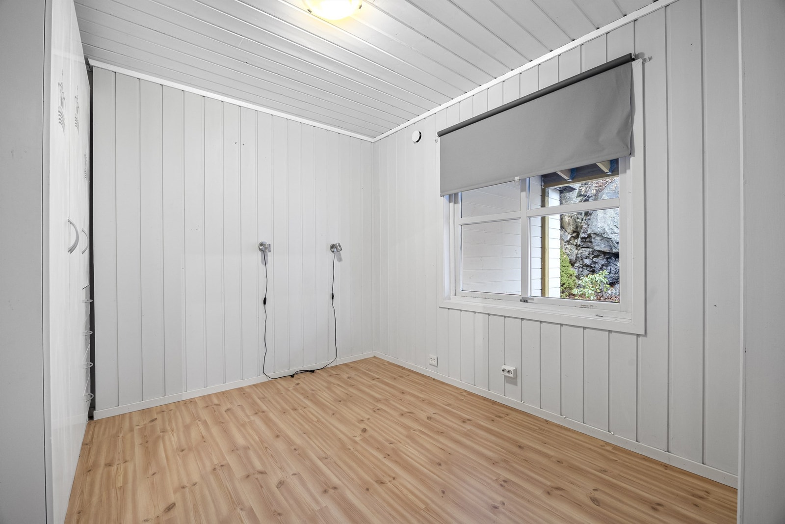Det ene av leilighetens to soverom Galleribilde