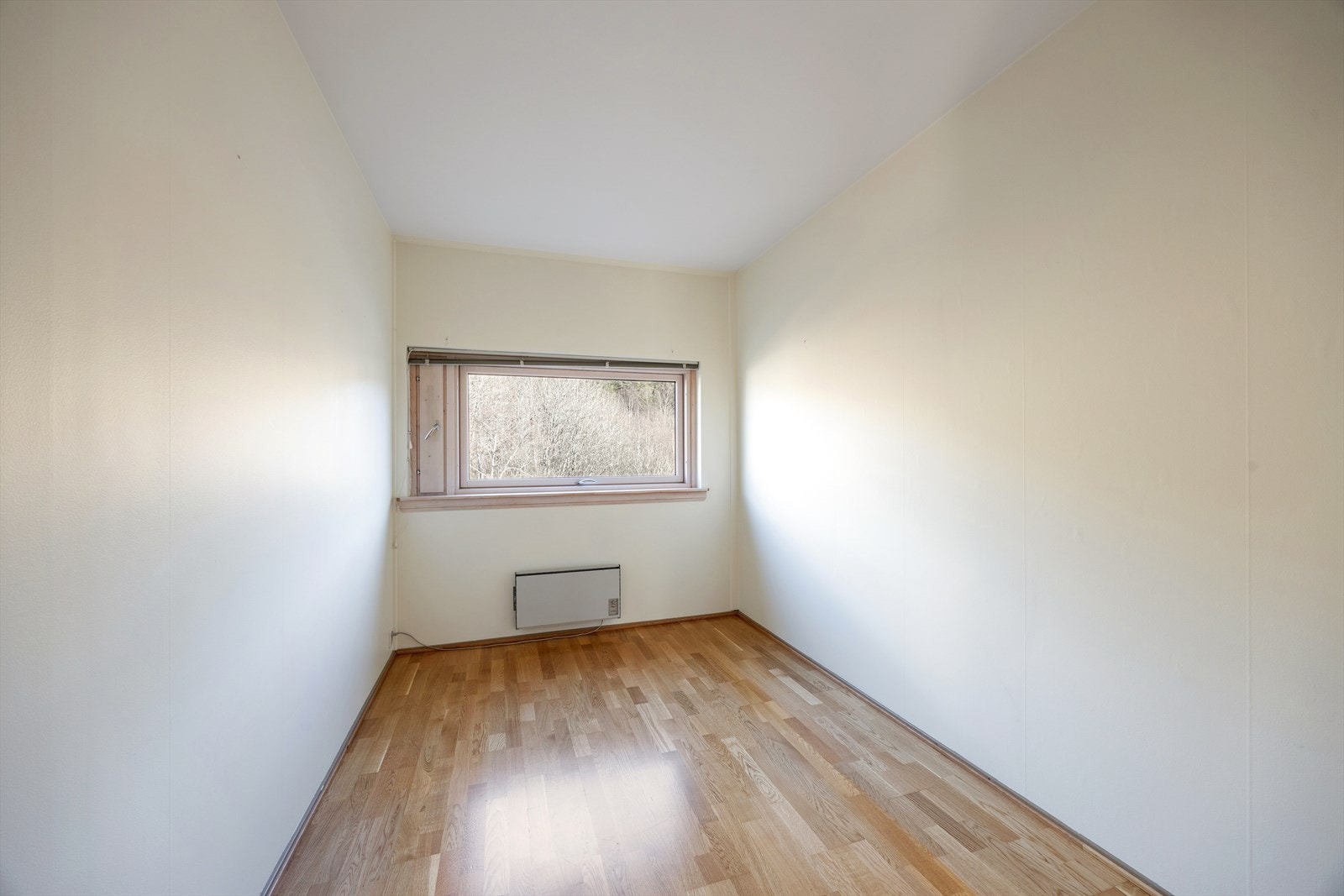 Det andre soverommet er av god størrelse og egner seg godt som gjesterom, kontor, barnerom eller hobbyrom. Galleribilde