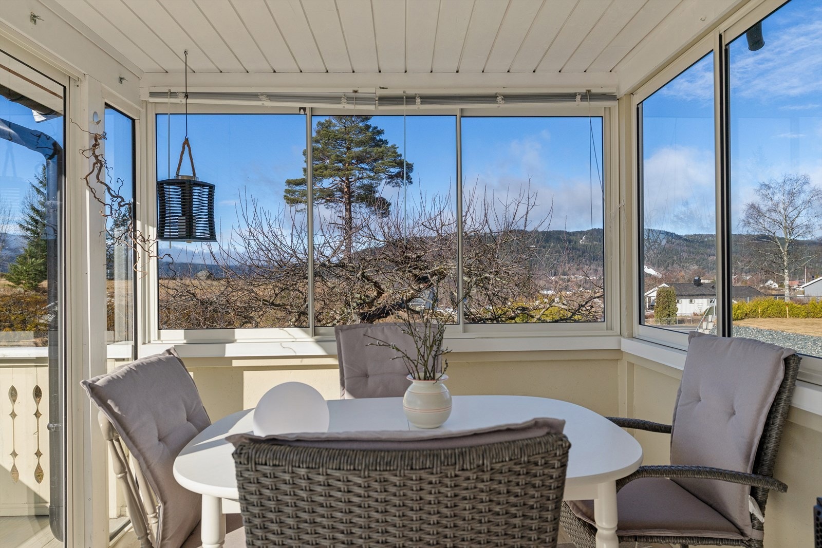 Innglasset terrasse som forlenger utesesongen. Galleribilde