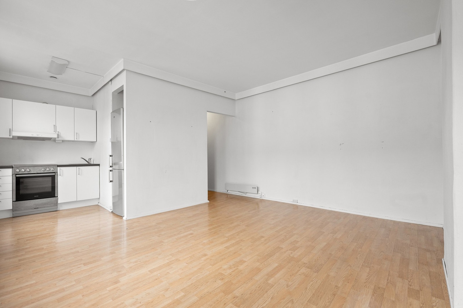 Stue og kjøkken i åpen løsning Galleribilde