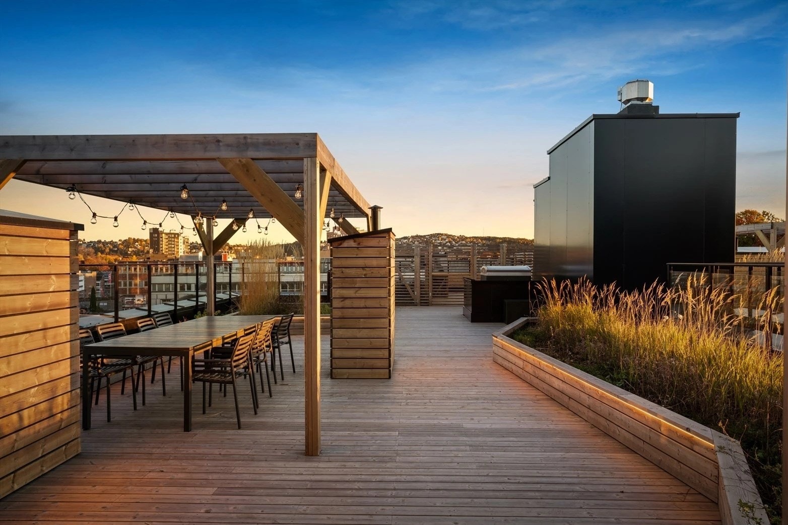 Nydelig takterrasse for beboerne i borettslaget. Foto: Ohshot Galleribilde