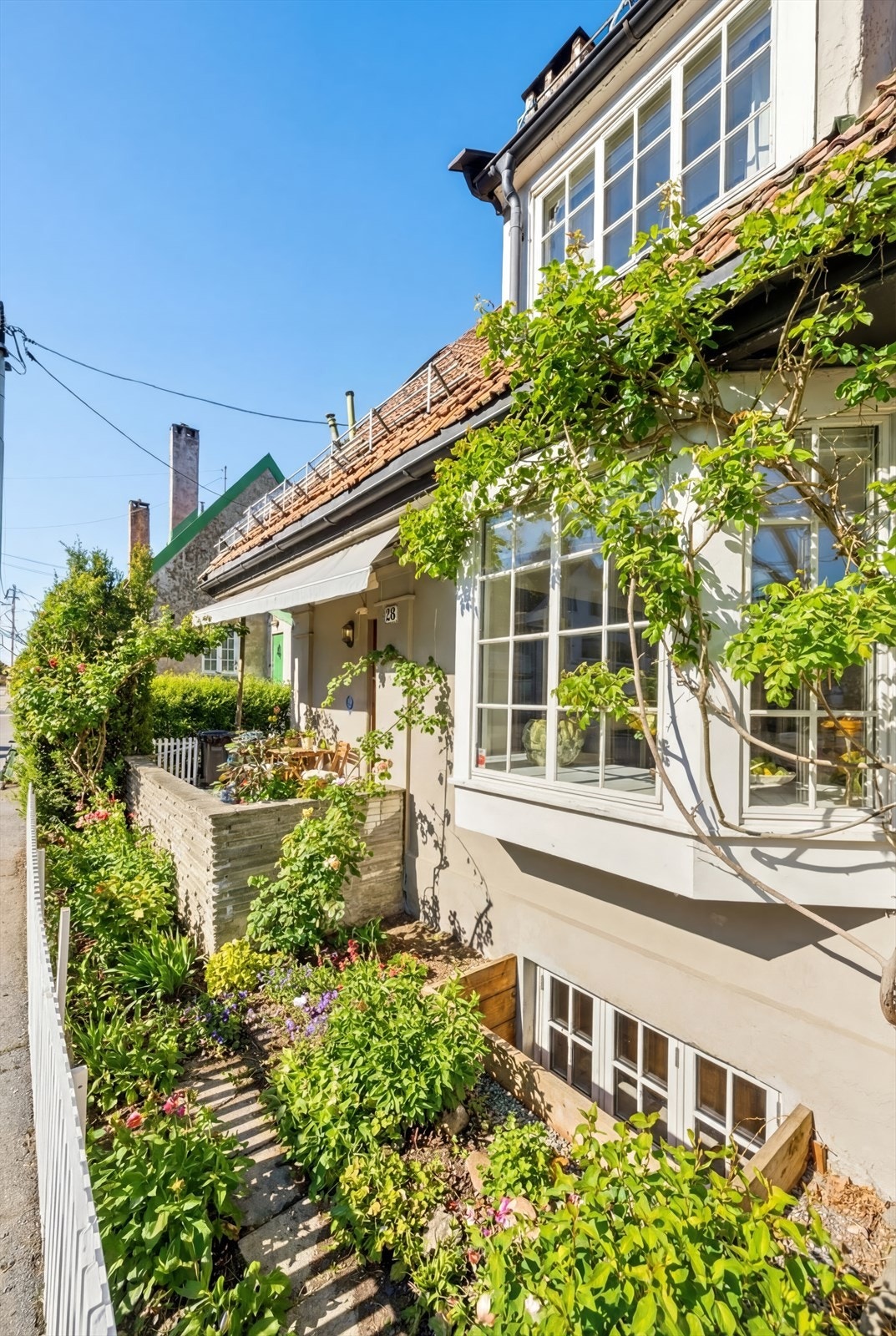 Velkommen til Norges første hageby: Engelsk inspirerte murvillaer på Oslos tak. Galleribilde