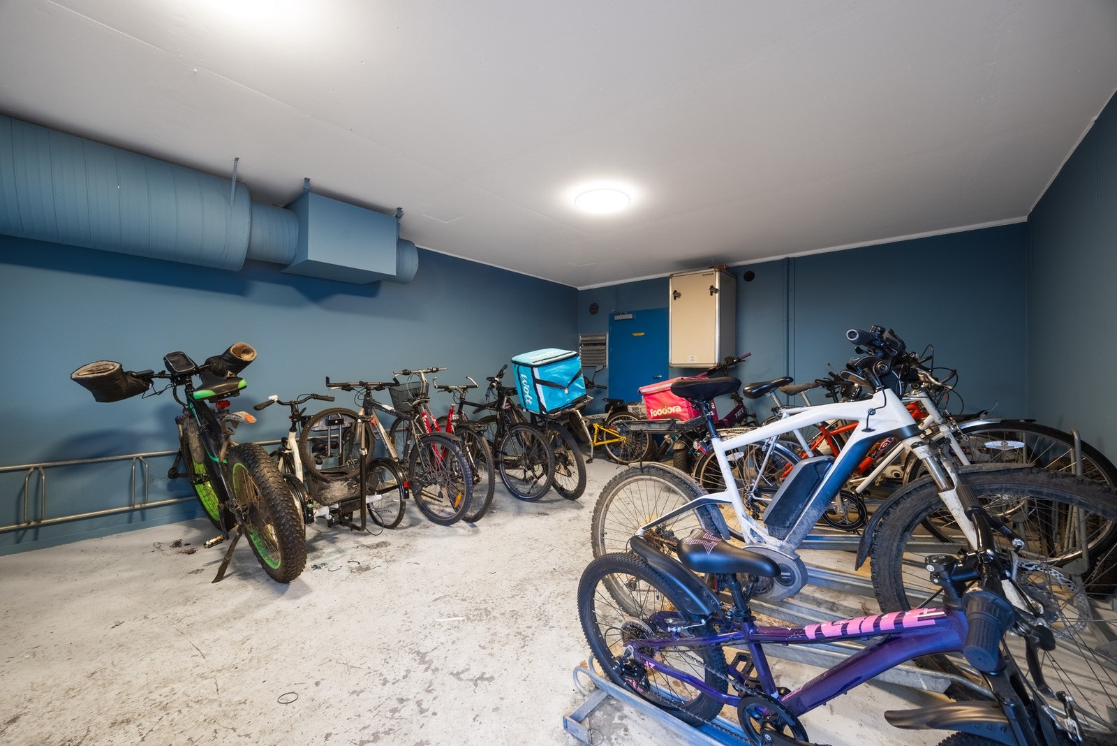 Felles, avlåst sykkelrom. Galleribilde